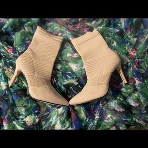 Brand new beige boots.